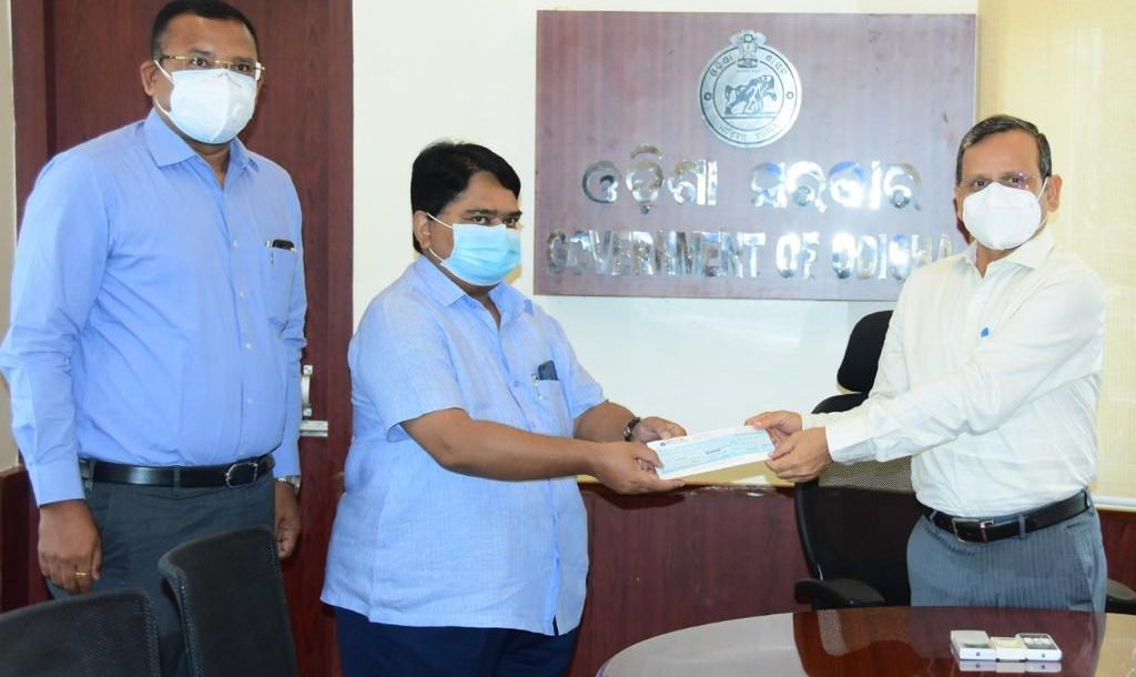 Pankaj Lochan Mohanty Chairman MGM Minerals Ltd and Saroj Ray Director of the company handing over a cheque of Rs 1 crore to the Hon’ble Chief Secretary towards Chief Minister’s Relief fund for COVID-19 free vaccination for the people of our state