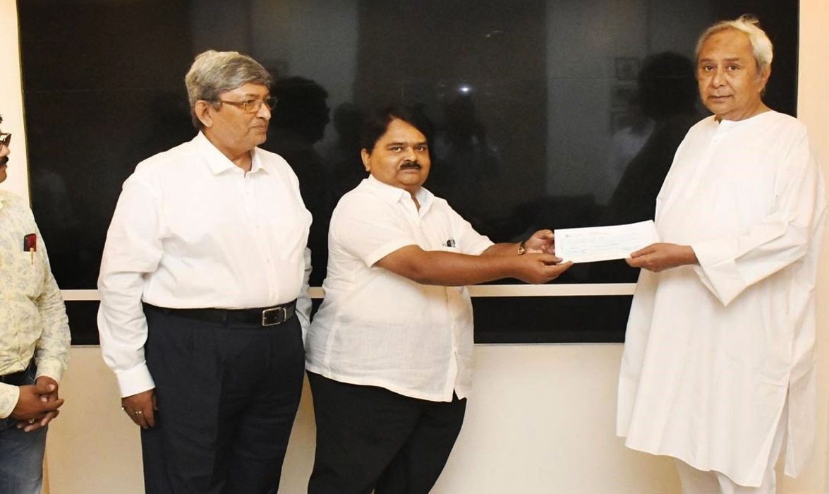 Chairman MGM Minerals Ltd. Handing over a Cheque of Rs. 50 Lakhs to Chief Minister Relief Fund, Odisha for Fani Cyclone